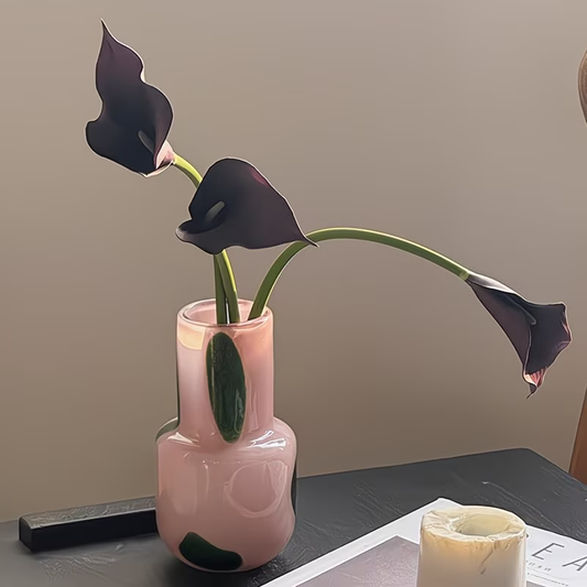 A jade-colored glass vase - an elegant and luxurious home décor.